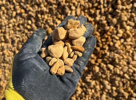 Brown river rock decorative landscape stone available in half inch three quarter inch and one and a half inch sizes Florida