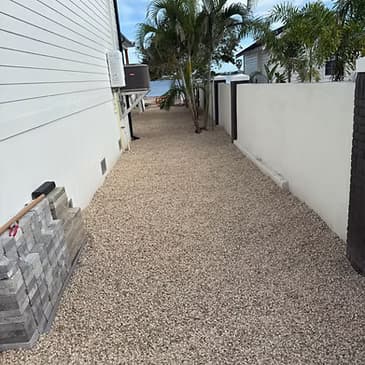 Brown river rock decorative stone landscaping project Southwest Florida